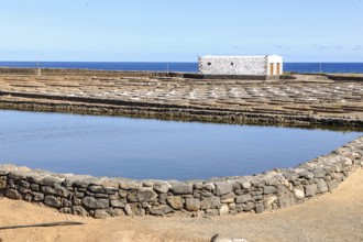 Historic salt works for salt extraction, today the salt museum Museo de la Sal, in the foreground