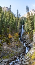 Barskon or Barskoon waterfall, mountain landscape with waterfall in a mountain valley, Jeti-Ögüz,