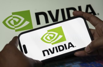 In this photo illustration, the Nvidia Corporation logo is displayed on an iPhone screen on January