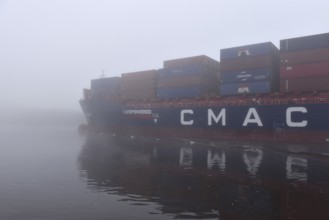 Containership Containerships Nord sailing in fog in the Kiel Canal, NOK, Kiel Canal,