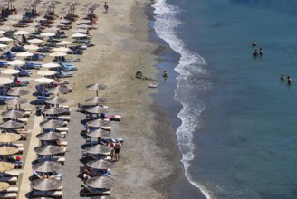 Parasols on Agia Galini beach, Agia Galini, south coast, Crete, Greece, Europe