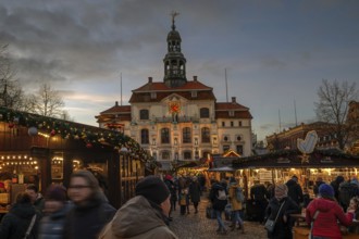 Christmas market at dusk, behind the town hall on the market square, Lüneburg, Lower Saxony,