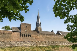 Town wall and parish church of St Martinus in the town of Zons, Dormagen, Lower Rhine, North