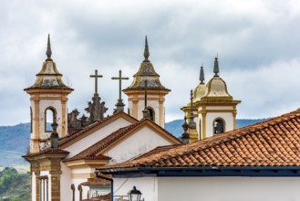 Towers and crucifixes of a baroque church in the historic city of Mariana in Minas Gerais Mariana,