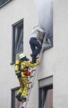 Duisburg, North Rhine-Westphalia, Germany, firefighting exercise, people are rescued from a burning