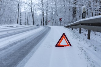 Car left the road in a bend due to snow and ice, Spitzgrund Coswig, Saxony, Germany, Europe