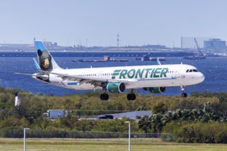 A Frontier Airlines Airbus A321 aircraft with the registration number N714FR at Tampa Airport, USA,