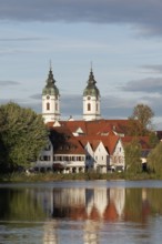 Church of St. Peter, view over the town lake, morning light, autumn, Bad forest lake, Upper Swabia,