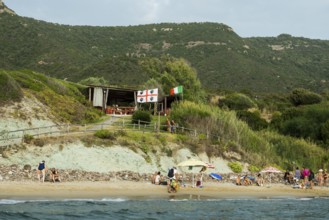 Beach and beach bar, near Alghero, Sardinia, Italy, Europe