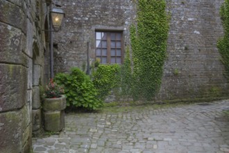 Backyard in Locronan village, Finistère department of Brittany in north-western France