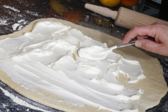 Swabian cuisine, preparation of savoury yeast plait with smoked meat, salty wreath bread, yeast