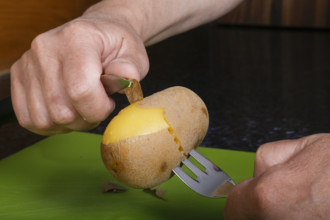 Swabian cuisine, preparation of Swabian potato salad with Stuttgarter Leberkäs in a