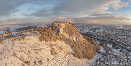 Aerial view, panorama of the snow-covered Hegau volcano Hohentwiel with Germany's largest castle