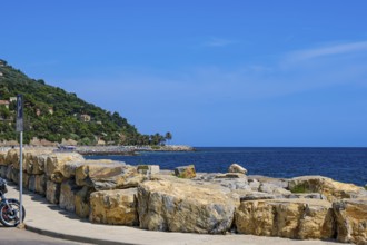 Long pier and coastline of the Riviera di Ponente with a view of the Ligurian Sea in the Oneglia