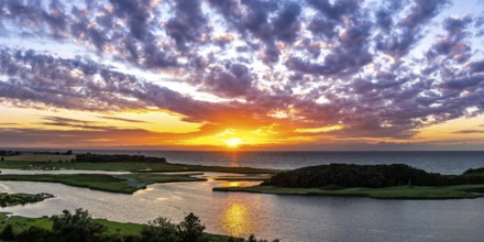 Sunset by the sea on the Baltic Sea Panorama in Heiligenhafen, Germany, Europe