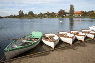 Rowing boats on the Meare boating lake, Thorpeness, Suffolk, England, United Kingdom, Europe