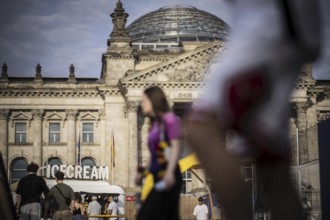 Scenes in the fan zone on Platz der Republik in front of the Reichstag building taken in Berlin, 29