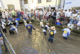 Fishing out the town stream, fishing day in Memmingen, Unterallgäu, Allgäu, Bavaria, Germany,