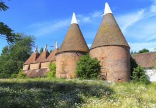 Historic oast house buildings at Sissinghurst castle gardens, Kent, England, UK