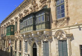 Traditional balconies of historic buildings in city centre, Valletta, Malta, Europe