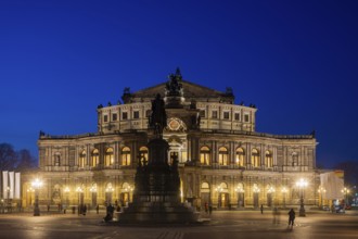 Semperoper am Theaterplatz with King Johann monument in the evening, Dresden, Saxony, Germany,