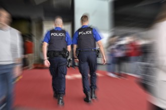 Wipe-clean image of policemen on patrol