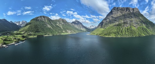 Panorama aerial view of fjord Hjorundfjord, village Urke (left), Mt. Stalbergneset (right), Mt.