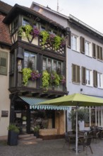 Flower shop in a historic half-timbered house in the old town centre of Gengenbach, Ortenaukreis,