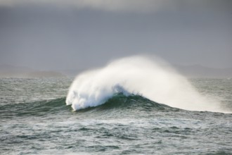 Large waves breaking on open water of the North Sea off the coast of Scotland