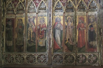 Medieval rood screen paintings, St Andrew church, Westhall, Suffolk, England, UK