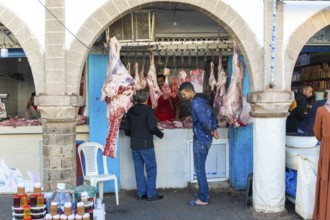 Meat hanging on hook at butcher shop in medina area of Essaouira, Morocco, north Africa, Africa