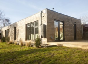 Oak panelling walls of modern newly built sustainable house at Snape, Suffolk, England, United