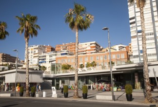 People walking in the newly redeveloped port area of shops and bars Malaga, Spain, Muelle dos,