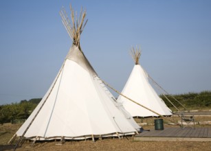 Campsite Indian tepees at Deepdale Camping, Burnham Deepdale, Norfolk, England, United Kingdom,