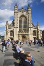 Tourists in the Abbey churchyard, Bath, Somerset, England, United Kingdom, Europe