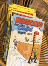 1980s children's cartoon comic book annuals Whizzer and Chips 1985, inside antiques centre,