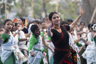 An instructor dance Bihu, as she teach participants during a Bihu dance workshop, ahead of Rongali