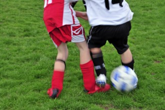 Foul, kick on the foot, participant in an E-1 junior football tournament, Baden-Württemberg,