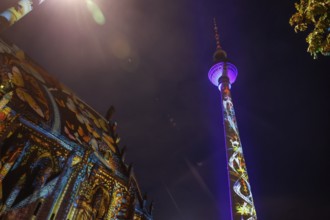 Festival of Lights, illuminated television tower at the Marienkirche, Berlin, 07.10.2024., Berlin,