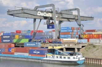 Container ship being loaded, inland harbour in Duisburg, North Rhine-Westphalia, Germany, Europe