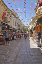 People strolling and shopping in the Grand Rue Jean Jaurès, decoration, pennant chain, tourists,