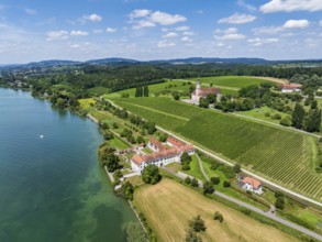 Aerial view of Maurach Castle on Lake Constance, below the Birnau pilgrimage church on a vineyard,