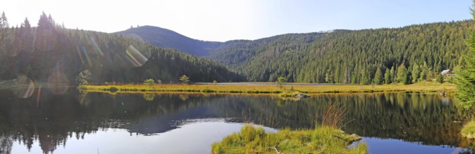 Autumn atmosphere at the small Arbersee lake in the Bavarian Forest