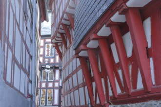 Half-timbered houses in narrow alley, idyll, red wooden beams, narrow, old town, Limburg, Hesse,