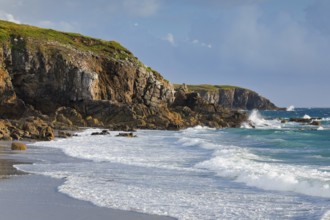 Waves breaking on the rocky coast near Plouarzel on the Atlantic coast, Département Finistère,