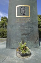 Ferdinand Graf von Zeppelin monument with head relief and quote, You only have to want and believe