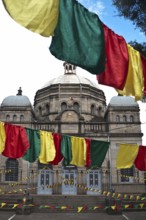 Holy trinity cathedral, orthodox christian place of worship in Addis Ababa, Ethiopia. Flags in the