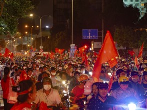 Football fans celebrate in the streets, victory in Asean championship against Thailand, many