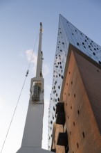 Elbe Philharmonic Hall and historic loading crane, Hafencity, Hamburg, Germany, Europe