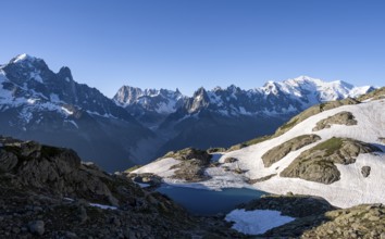 Mountain landscape in the morning light with mountain lake Lac Blanc, mountain peaks Grandes